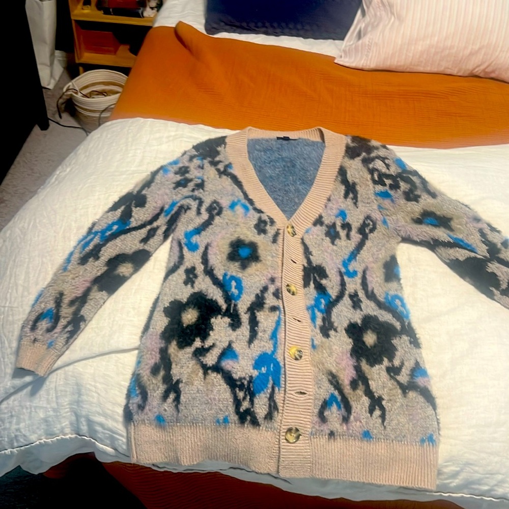 ModCloth cardigan. Very warm. Over sized fit. 
Size M